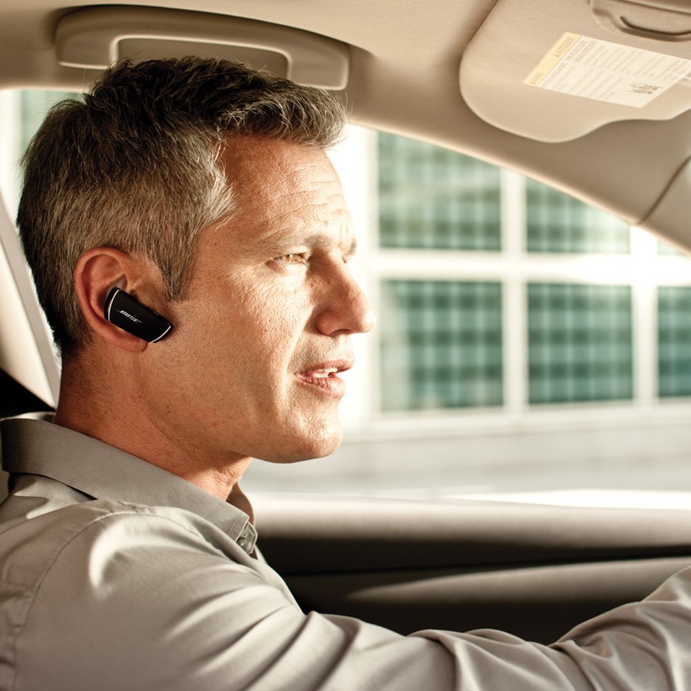 Pictures of bluetooth headset for your phone in the car man